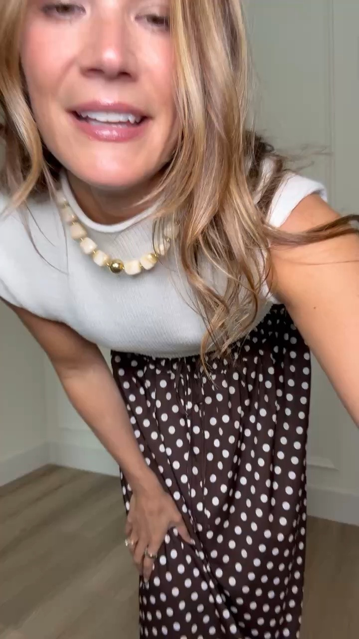 This polka dot midi skirt is such a timeless piece that you can wear year round. I love it paired with a simple sweater tank for the office, brunch, or dinner, and the flowy fit makes it just as comfortable as it is polished. I’m wearing a medium and it fits true to size.

Polka dot skirt, midi skirt, office outfit, workwear style, feminine fashion, classic style, modest outfit, summer to fall outfit, Amazon fashion, wardrobe staple, effortless style, StangandCo

#LTKWorkwear #LTKTall #LTKootd