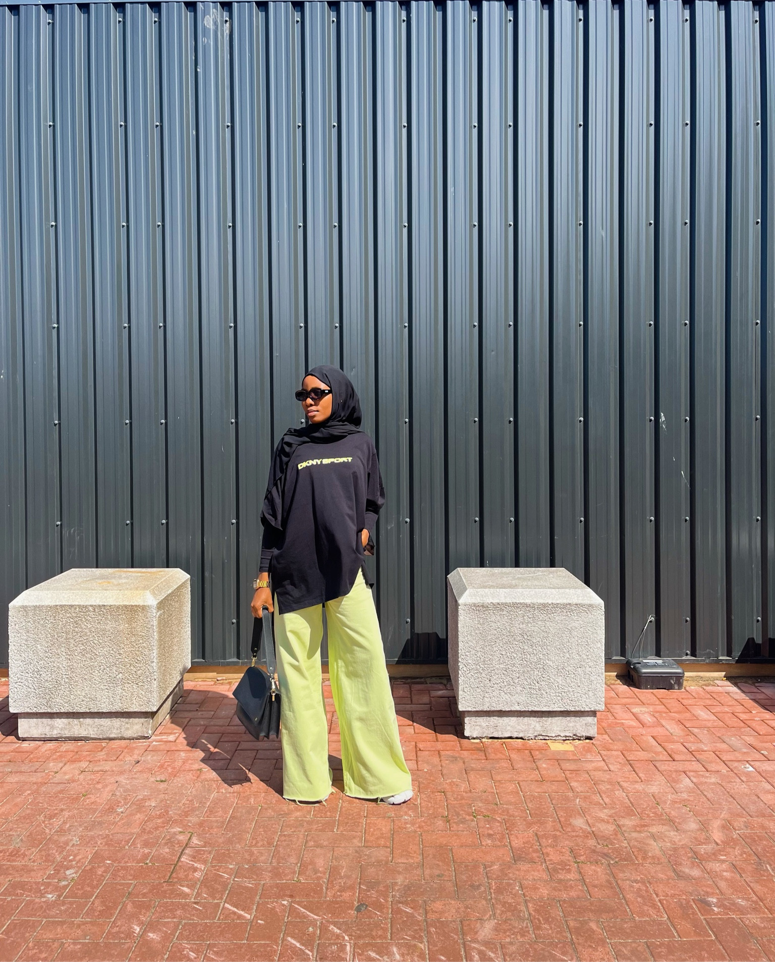 The perfect coloured jean for a transitional outfit. Wide leg jeans, black shirt, black handbag. 

#LTKeurope #LTKstyletip