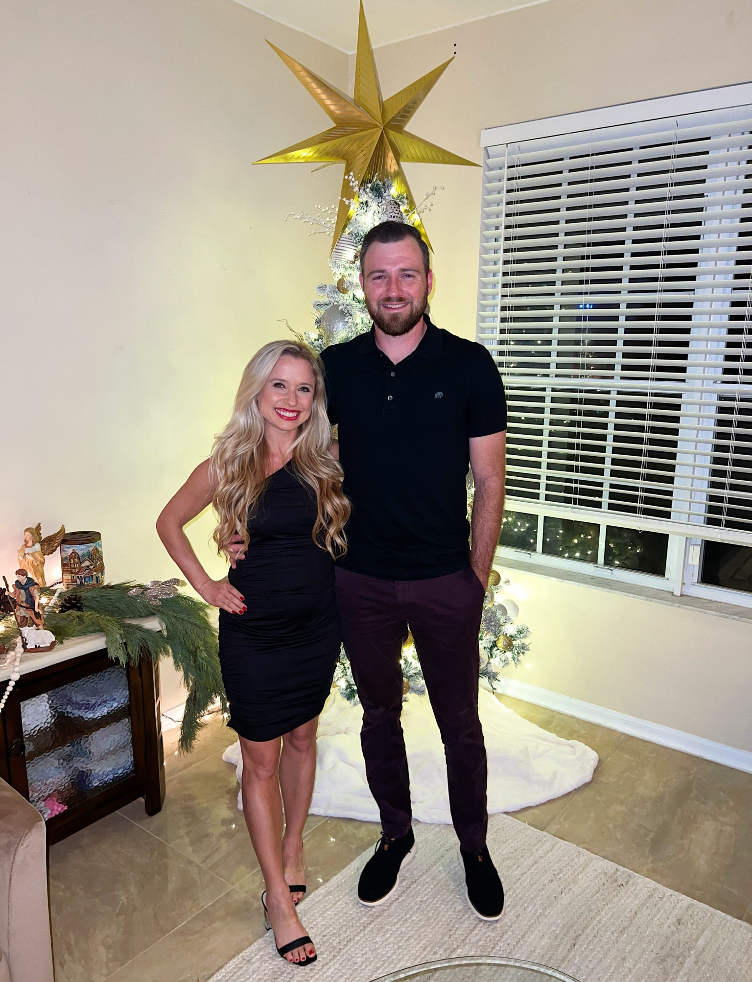 Wore at 4.5 months preg with my first for NYE! Super stretchy 