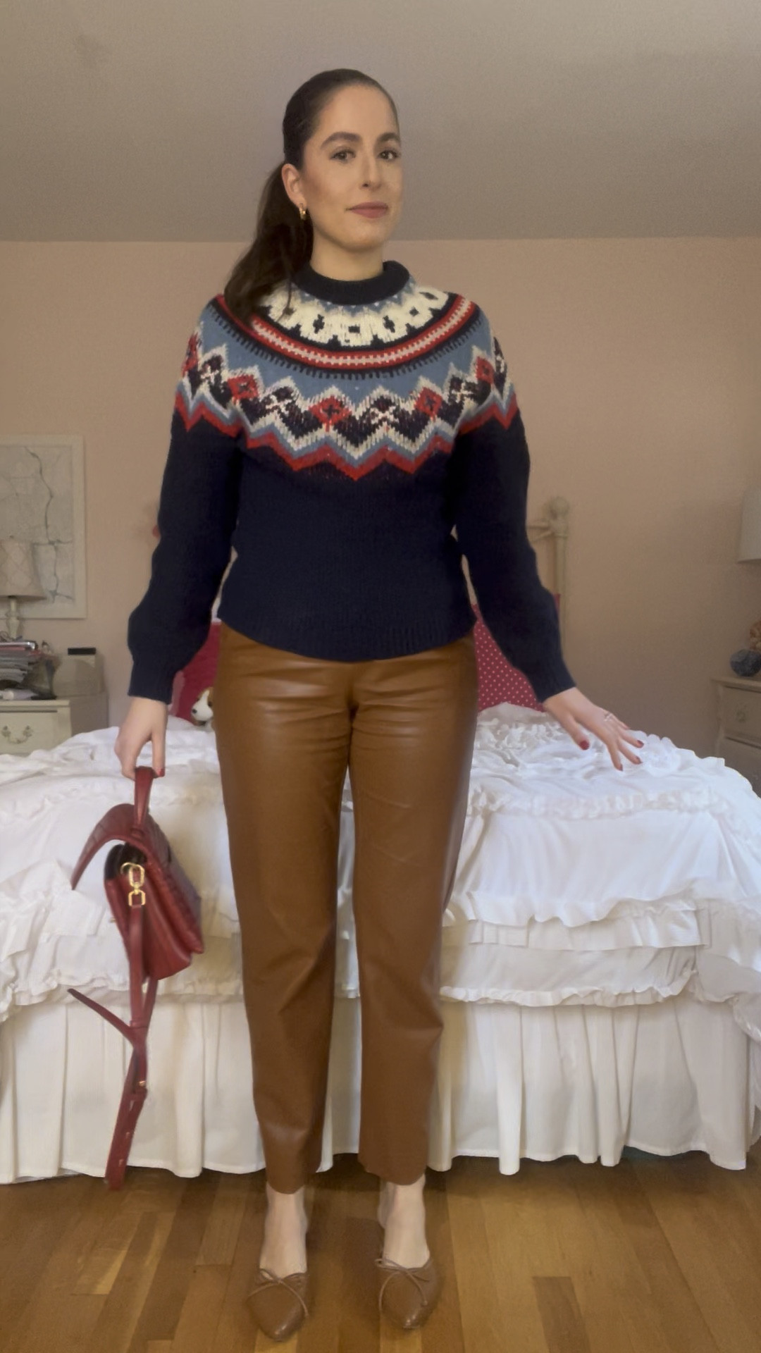 Fair isle sweater, faux leather pants, brown leather pants, leather pants, brown mules, winter outfit, brown faux leather pants, brown shoes, casual winter outfit, fair isle, winter sweater, red bag, red top handle bag 

#LTKFindsUnder100 #LTKStyleTip #LTKSeasonal