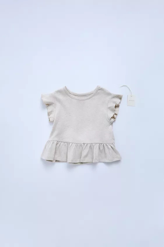 An enhanced experience.Check it out in the app. | Zara US