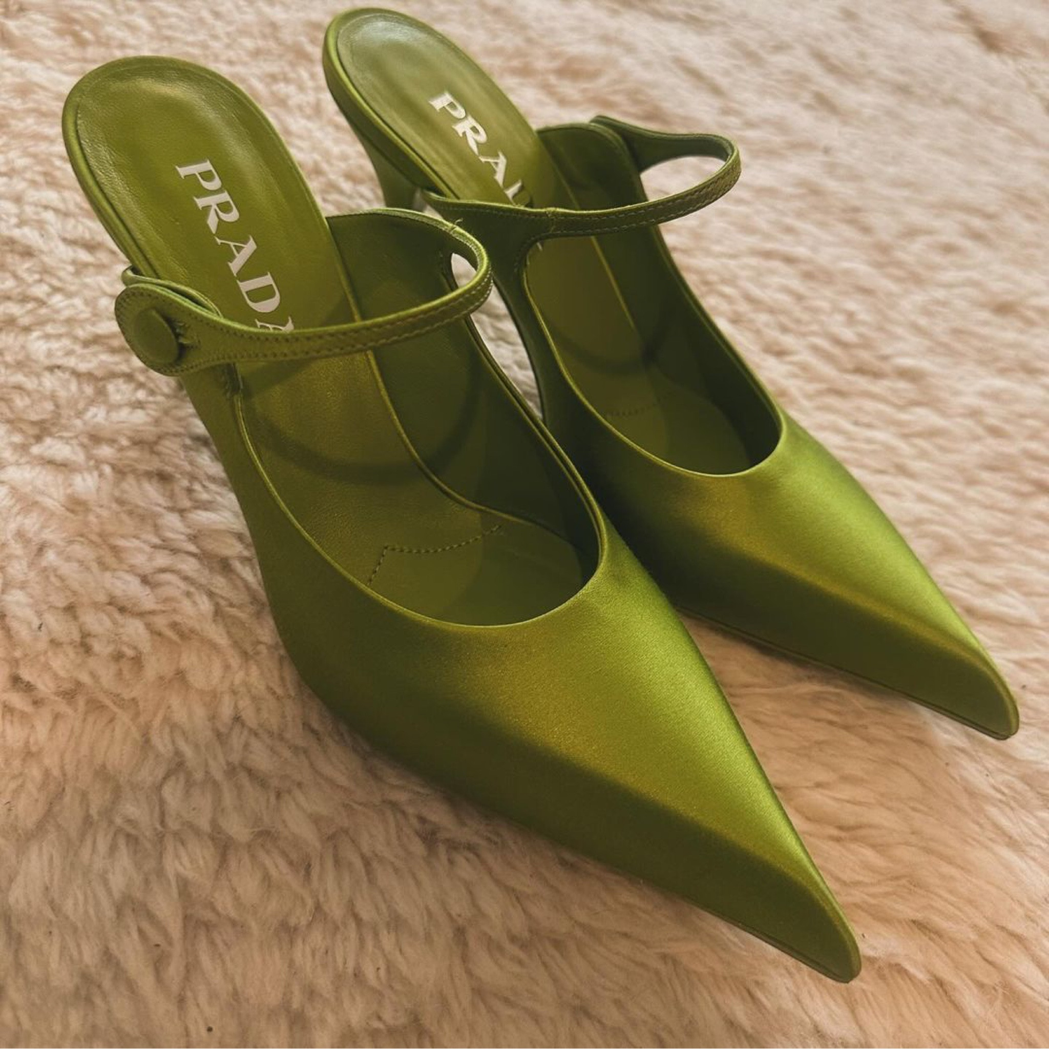 The color of these mules is so pretty. From Prada 💚