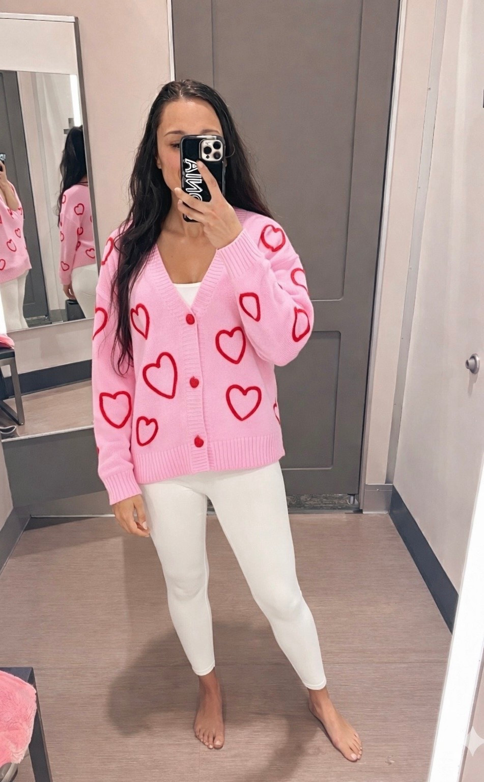 Soft, cozy, and full of heart 💕 this pink heart cardigan is such a fun statement piece—super soft knit, relaxed fit, and easy to dress up or down. I paired it with a simple tank and leggings for an effortless everyday look, but it’d be just as cute with jeans. Linking it on LTK 🤍 #LTKFinds #CozyStyle #HeartSweater #EverydayOutfits 

#LTKootd #LTKSeasonal #LTKSaleAlert