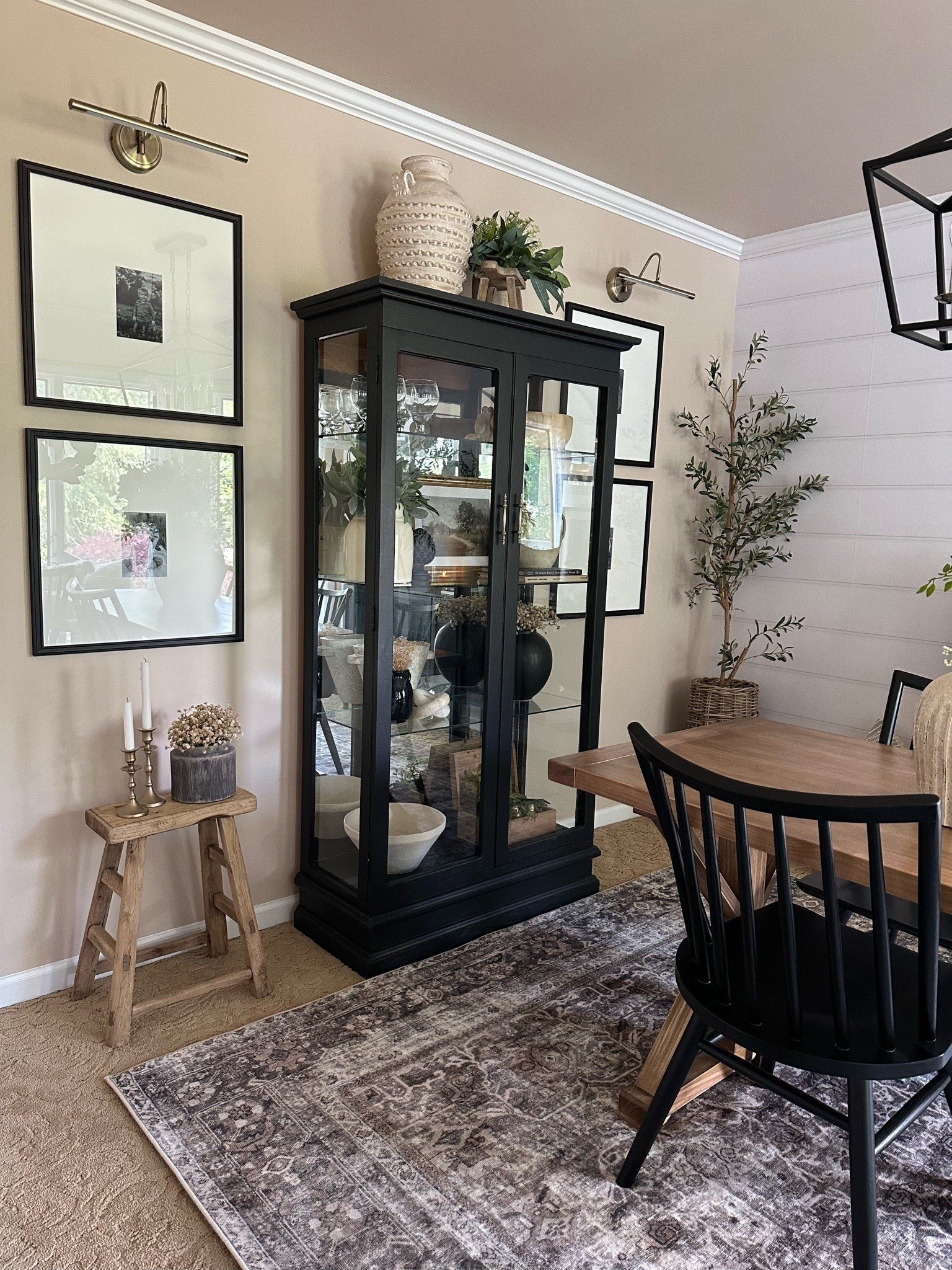 Dining Room Views. Follow @farmtotablecreations on Instagram for more inspiration. 

So many requests and questions regarding this black curio cabinet. Can you believe that I made this back in high school?! 😂 Unfortunately I cannot link it for you, but I did find one similar. 

Olive Tree | Budget Friendly | Amazon Home | Target Finds | Loloi Rugs | Hearth & Hand Magnolia | console table | console table styling | faux stems | entryway space | home decor finds | neutral decor | entryway decor | cozy home | affordable decor |  home decor | home inspiration | spring stems | spring console | spring vignette | spring decor | spring decorations | console styling | entryway rug | cozy moody home | moody decor | neutral home


#LTKHome #LTKFindsUnder50 #LTKSaleAlert