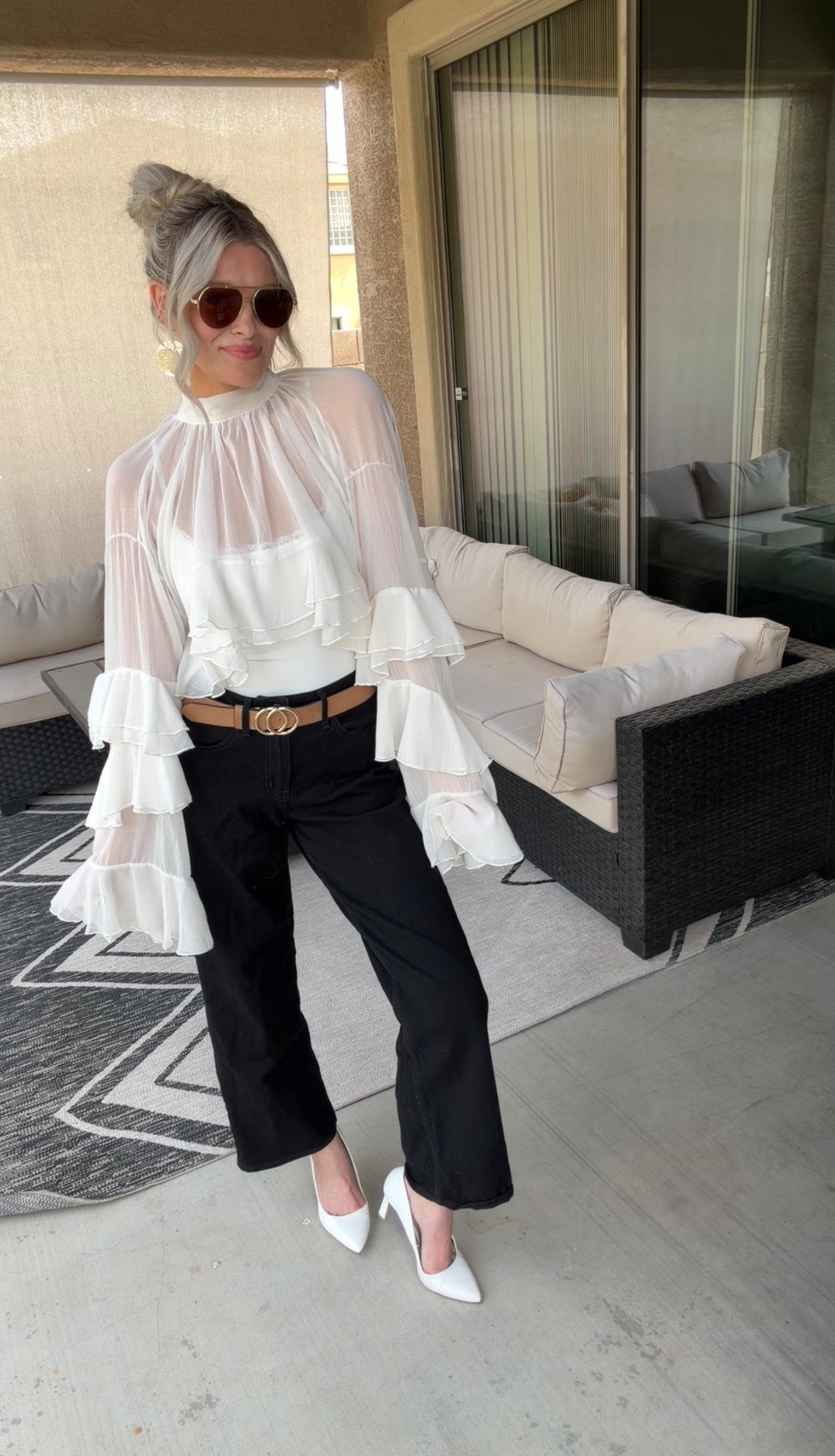 Wearing a dreamy @Chicwish  sheer ruffle blouse with a high neckline and dramatic tiered sleeves that make such a statement 🤍 

#LTKootd #LTKgrwm #LTKFestival