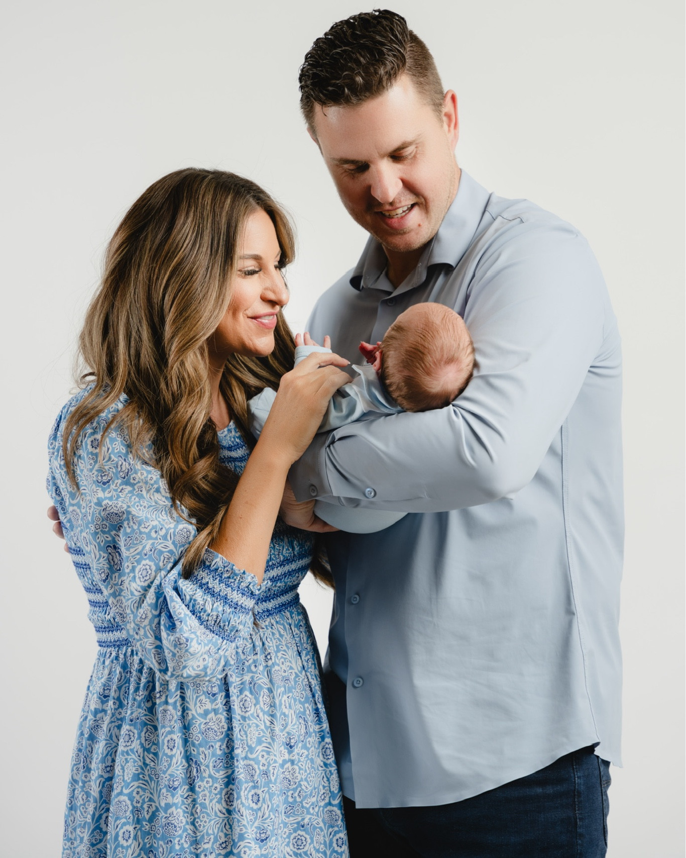 Newborn photoshoot 💙 In a small Tuckernuck maxi, linked similar styles! 

#LTKBaby #LTKFamily #LTKStyleTip