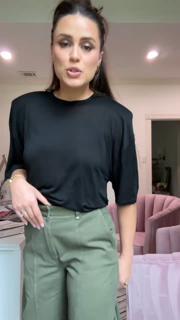 Two Zara pieces, one under $50, one under $100 and somehow the outfit looks like a whole decision.

The barrel cargo pants you've seen me wear approximately a thousand times by now — and yes, I'm still reaching for them. The fit is relaxed through the hip, tapers at the ankle, and works on more body types than you'd expect. The shoulder pad tee is the part people are going to ask about. Flowy through the body, structured at the shoulder — it does that thing where one piece holds the whole outfit together without trying.
This is the combo for when you need to look put together but also need to be able to move. School pickup, lunch, a day that goes three directions. Houston: both pieces breathe. You're welcome. 

 