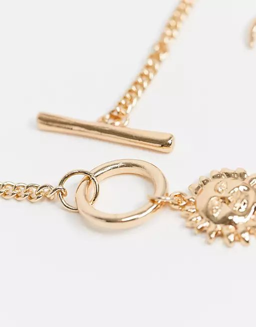 ASOS DESIGN necklace with T-bar and sun and moon in gold tone | ASOS (Global)