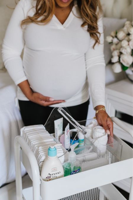 Sweet dreams and tiny necessities – my bedside newborn cart is stocked with all the essentials for our little one’s cozy slumber.