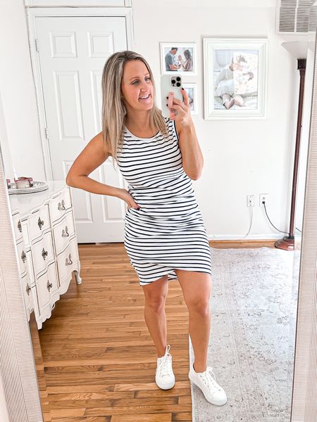 Bodycon form fitting black and white striped dress (size small). 