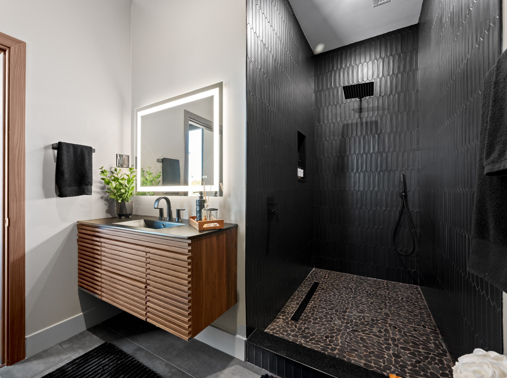 Modern Organic Bathroom 🌿

Dark, dramatic, and beautifully grounded in nature. This modern organic bathroom feels like a private spa retreat. A sleek black soaking tub, warm wood accents, and layered organic textures bring balance, warmth, and calm to the space.

Every element was intentionally chosen to create a bathroom that feels both luxurious and deeply relaxing. It’s hard to believe this is a master bathroom and not a high end spa. 🖤 

 #LTKHome