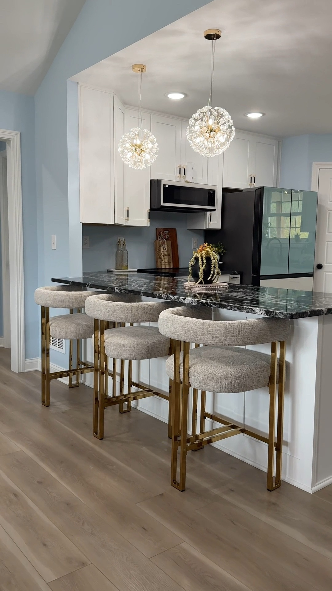 I love how these gorgeous barstools immediately elevated the look of this space.

#LTKHome