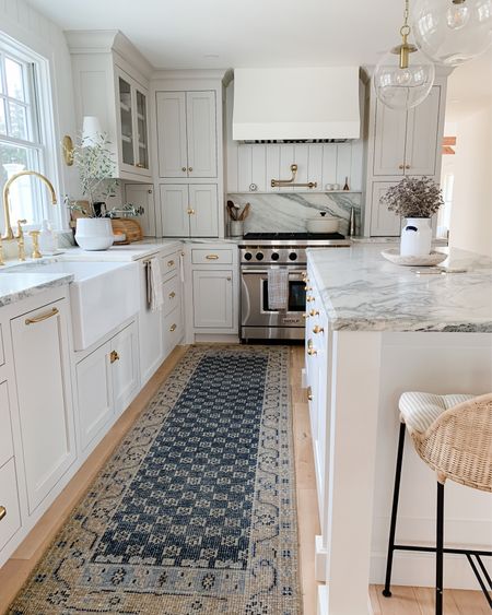 Bright and airy timeless kitchen with natural finishes including marble, unlacquered brass, rattan stools and more. Shop the look and follow @pennyandpearldesign for more interior design and home style ✨

#LTKunder100 #LTKstyletip #LTKhome