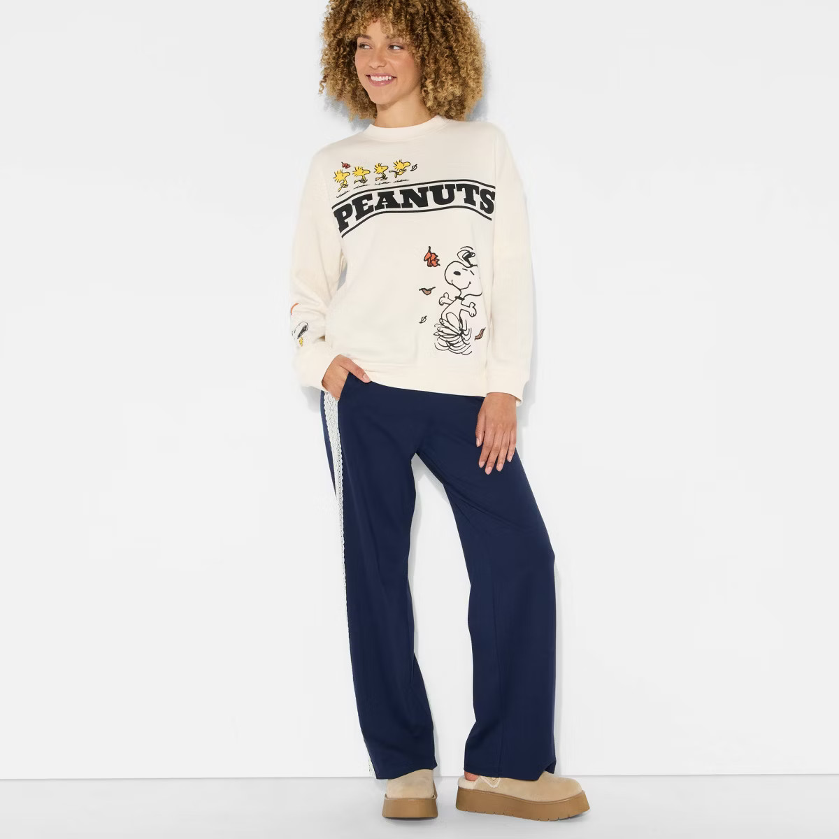 Women's Peanuts Fleece Graphic Pullover Sweatshirt - Ivory | Target