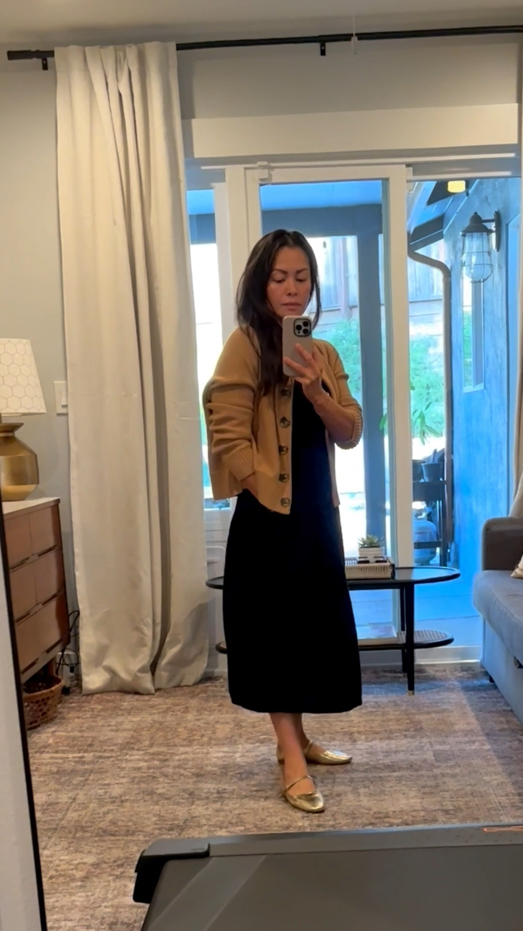 Work outfit of the day - still hot in the Bay Area so it’s a dress and cardigan for the always cold office. Paired it with my comfy gold ballet flats. 

#LTKWorkwear #LTKOver40 #LTKPetite