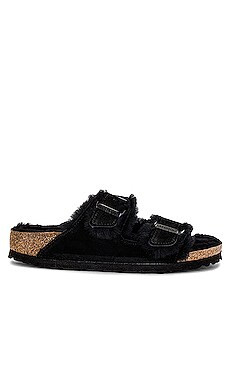 BIRKENSTOCK Arizona Shearling Sandal in Black from Revolve.com | Revolve Clothing (Global)