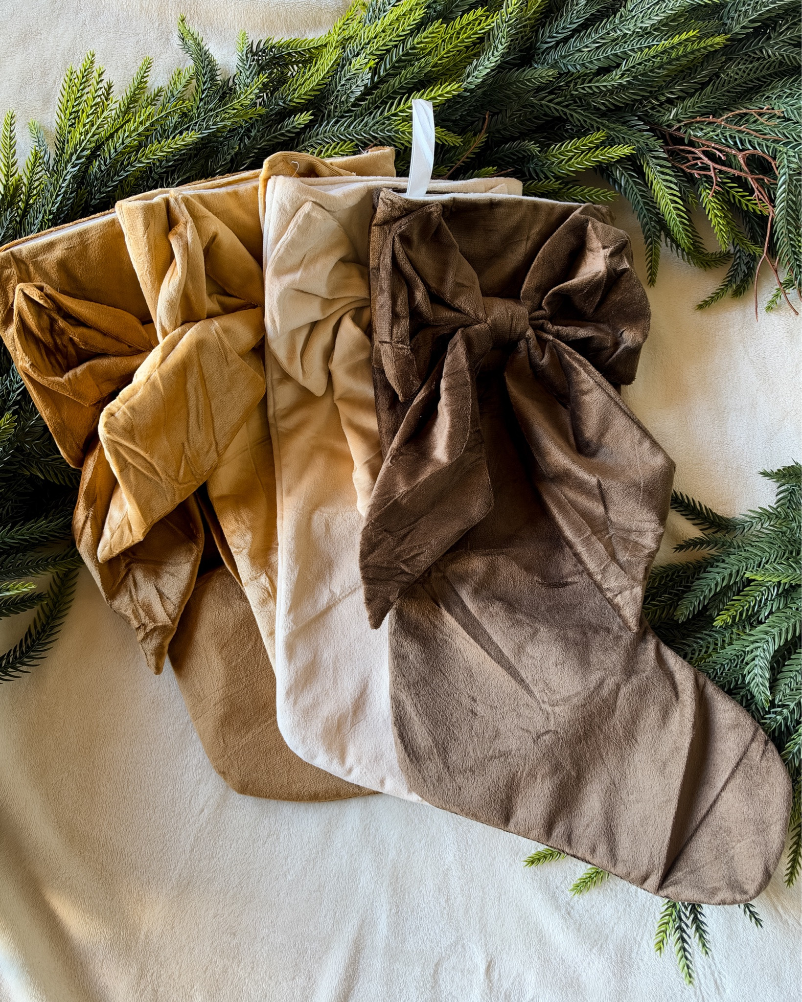 I grabbed this 4 Pack of 18" Velvet Bow Stockings from Amazon and am SO impressed with the quality and fabric.  Can't wait to use these beauties for holiday gift bags and decor. #amazonholiday #amazonhome 

 #LTKdayinmylife #LTKSeasonal #LTKHome