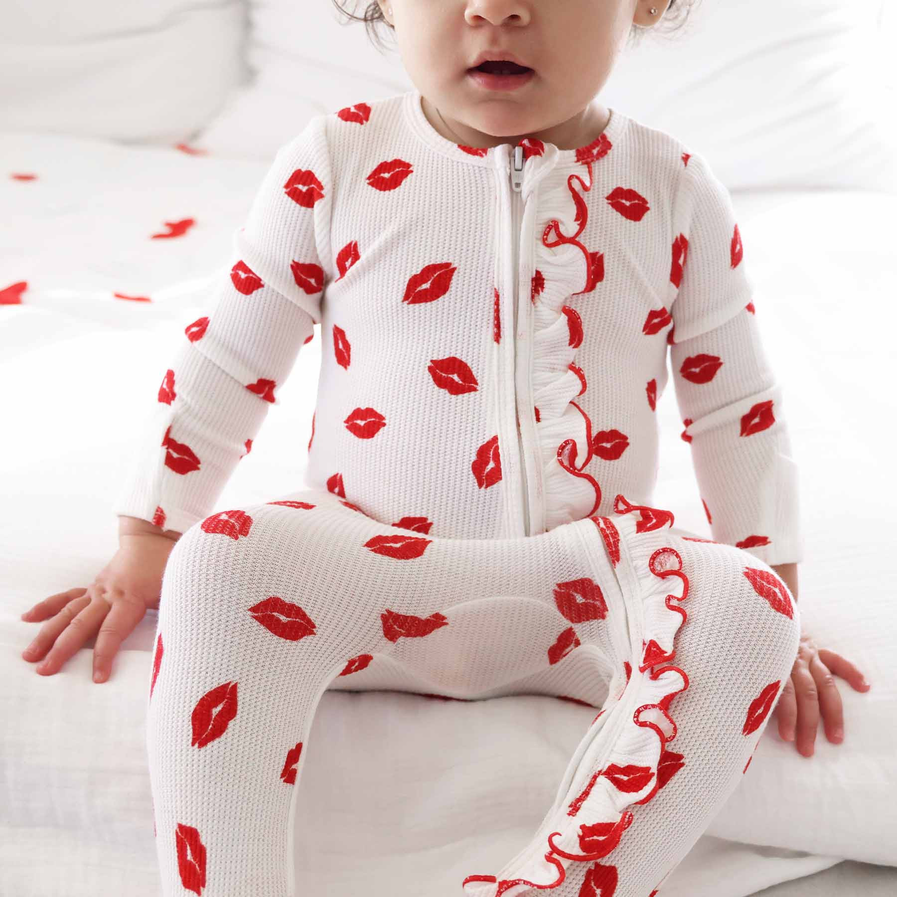 Little Kisses Bamboo Waffle Ruffle Zipper Footie | Caden Lane