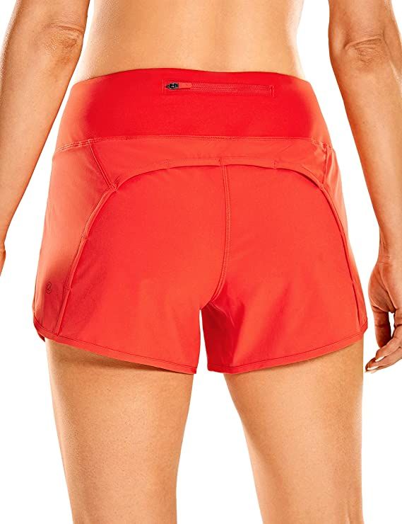 CRZ YOGA Women's Mid-Rise Quick-Dry Athletic Sports Running Workout Shorts with Zip Pocket - 4 In... | Amazon (US)