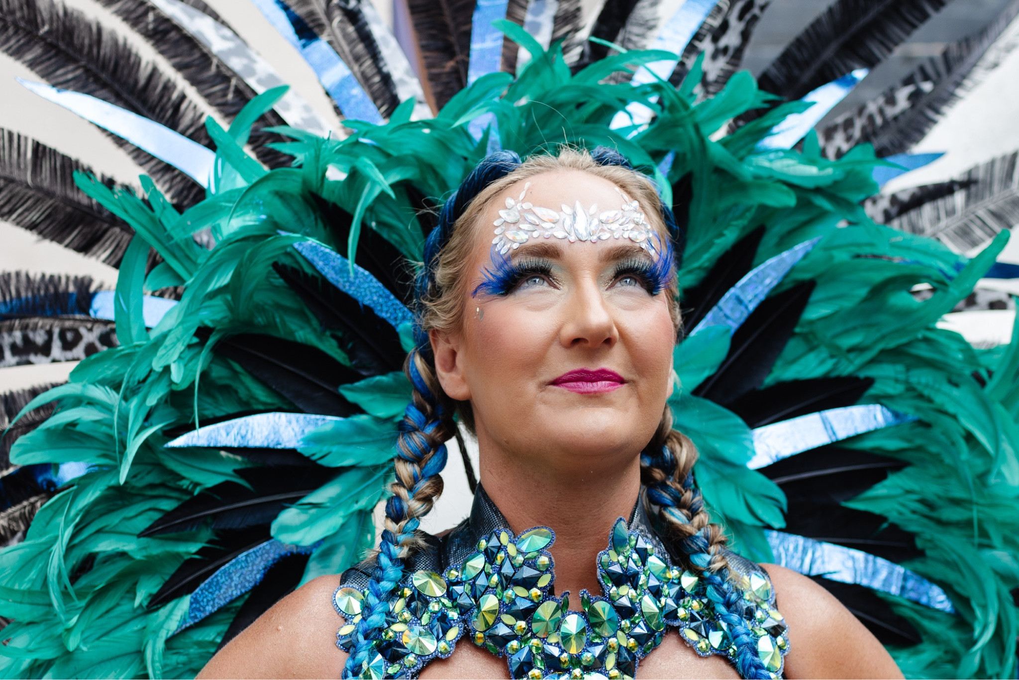 Carnival makeup face gems with blue feather lashes

#LTKSeasonal #LTKbeauty #LTKtravel