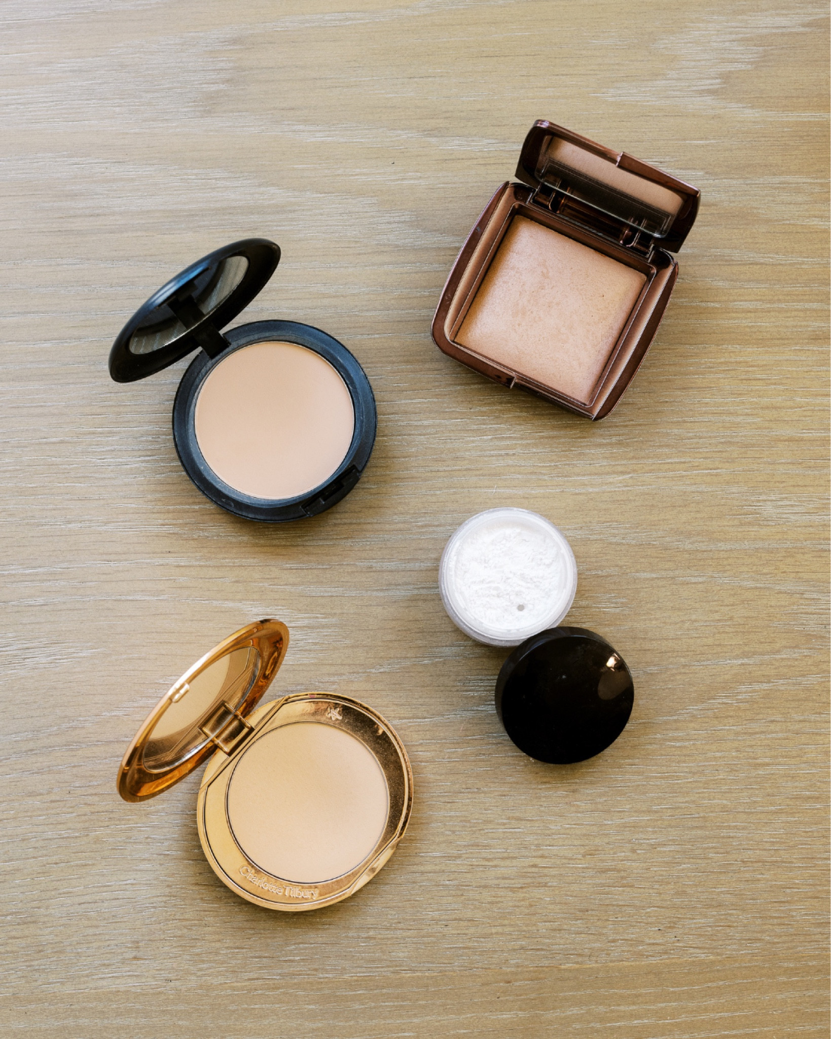 Glam Glossary | Powder

Charlotte Tilbury Airbrush Flawless Finish Filter Skin Perfecting Micro-Powder / 2 Medium

Hourglass Ambient Lighting Powder / Dim Light

MAC Studio Fix Powder Plus Foundation / NW22

Laura Mercier Secret Brightening Loose Powder for Under Eyes /  1

#LTKbeauty