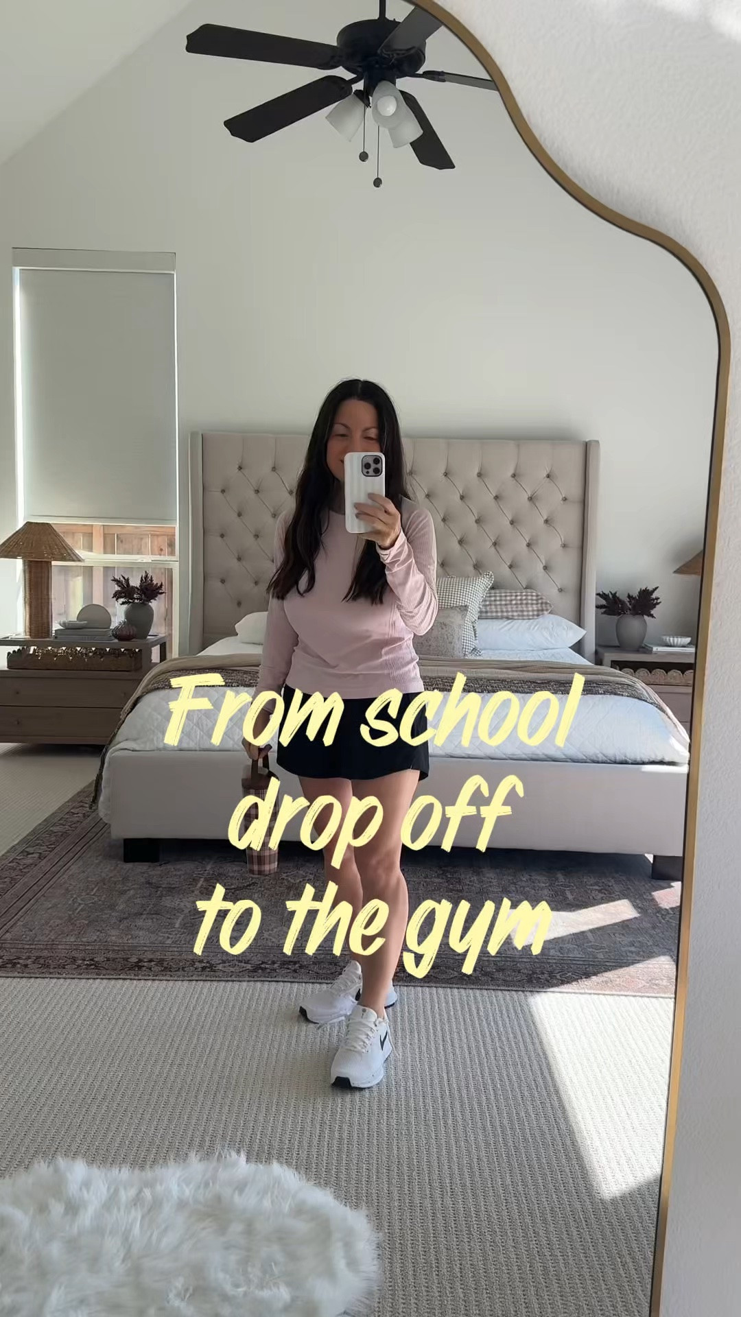 The kind of comfy everyday outfit I find myself reaching for again and again! 💗 If you love casual athleisure outfits that are cute, comfortable, and easy to throw together, this pink long sleeve top with black athletic shorts and white sneakers is such a good combination!

Perfect for busy mornings, school drop-off, coffee runs, running errands, morning walks, or heading out for the day. I love the soft pink paired with classic black shorts for an effortless sporty casual look that still feels feminine and put together. And of course, a cute tumbler completes the outfit!

This is such an easy outfit idea for warmer fall weather when you’re not quite ready for leggings and sweatshirts. Whether you’re looking for casual mom outfits, comfortable everyday fashion, fall outfit over 50, fall athleisure outfit ideas, sporty outfits for women, or simple throw-on-and-go outfits, this is one of those combinations you’ll want to recreate.

Shop my everyday athleisure outfit, sneakers, and tumbler all linked here! 🤍