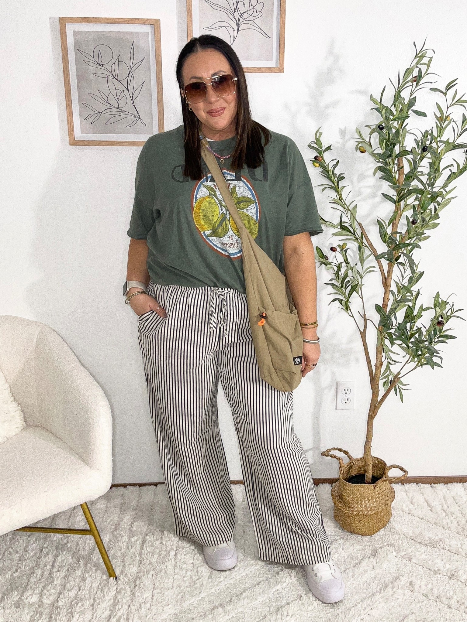 OOTD that just works! Comfy and midsize friendly. Large oversized Aerie tee. Large AE wide leg pants. Amazon bag. Amazon sunnies. Ruffle socks. Linked similar converse sneakers. Amazon bracelets and rings  

#LTKSaleAlert #LTKmomlife #LTKOver40