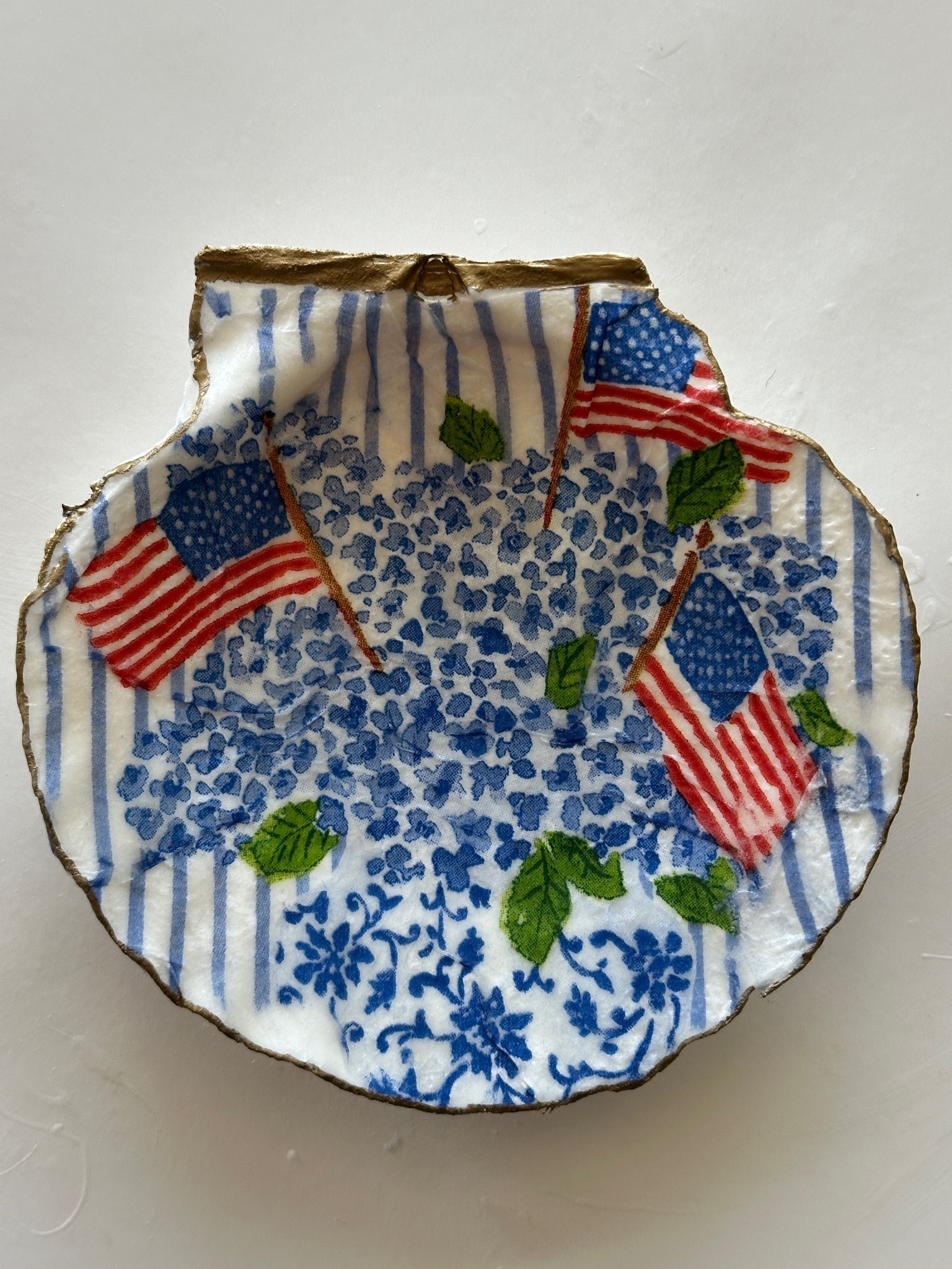 Decoupage a shell with these items.  Great to make a cute trinket tray or display in a summer vignette!

#LTKSeasonal #LTKHome #LTKdayinmylife