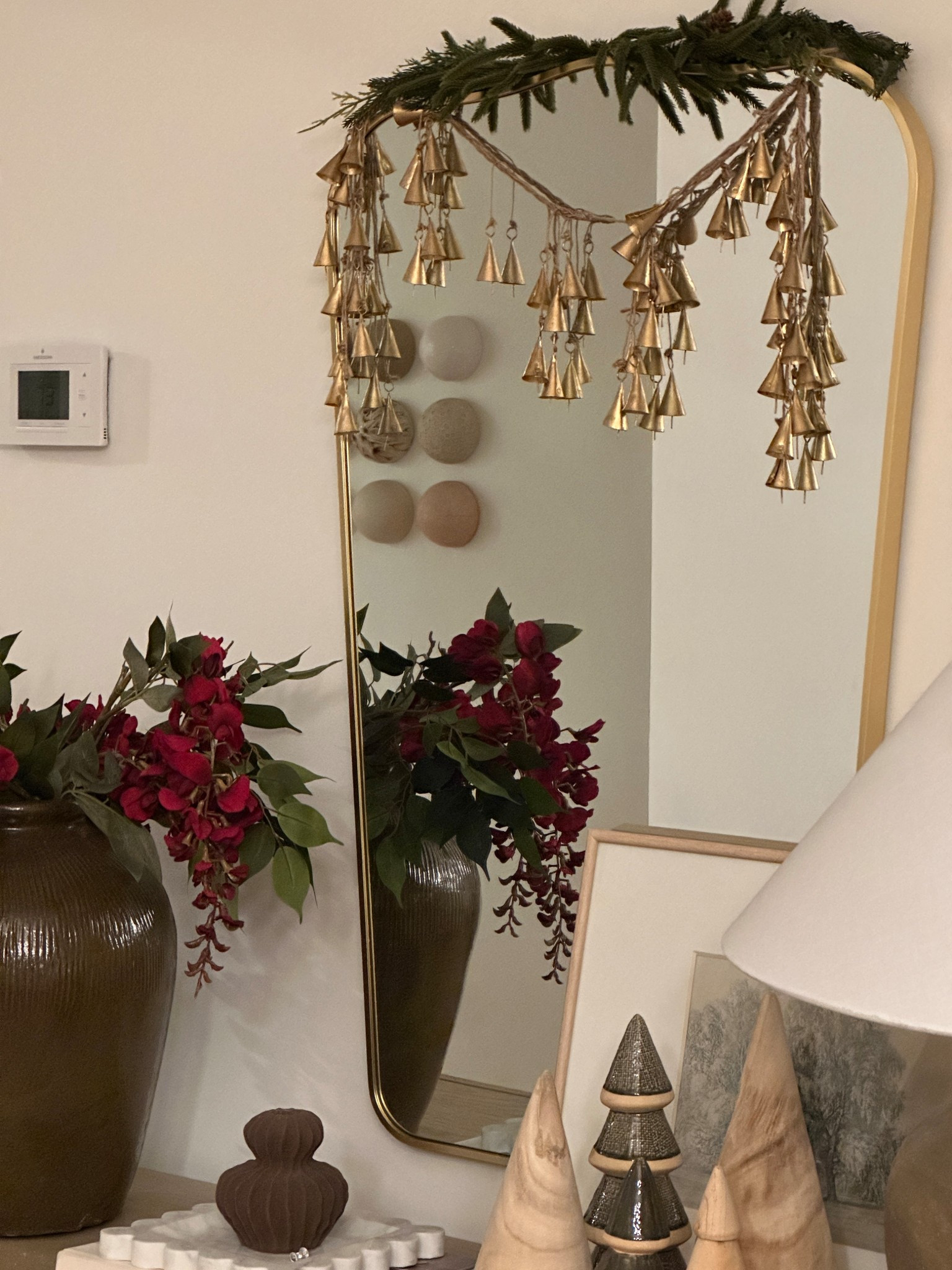 My “bell garland” is actually just 4 of these individual clusters tied together!

#LTKHoliday #LTKHome