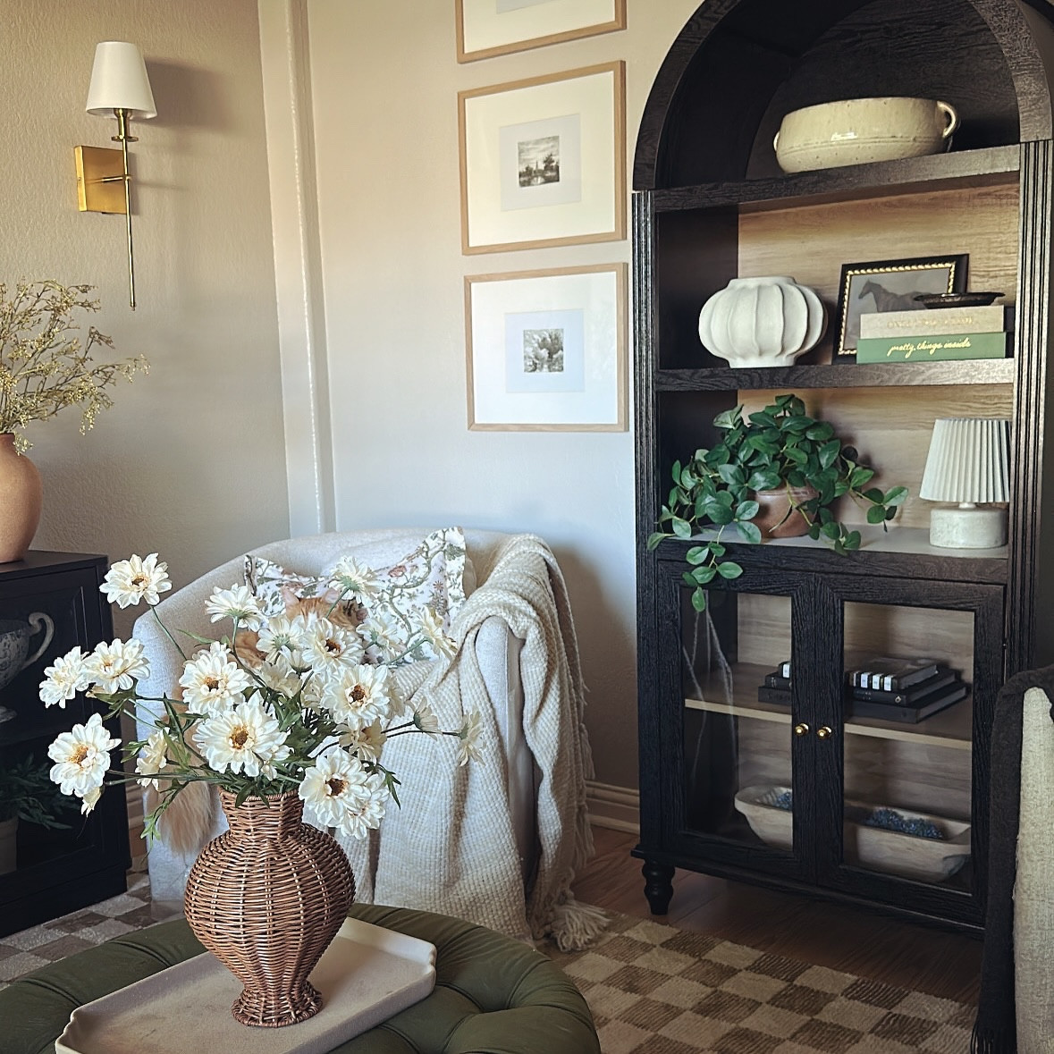 Happy Sunday 😎

Sunday stills of one of my favorite spaces in our home, the sitting room. 🤌🏼🤌🏼

Can you spot the newest addition to our sitting room………? 👀🖤

I wanted to share this absolutely stunning arched cabinet I got from @polihome.official , available on Amazon! #gifted 🖤‼️😱

It has a built in outlet, marble and wood shelves, and a beautiful black wood that just ties it all together so perfectly! Ahh I’m just obsessed! 😊🤭🫶🏼

#LTKHome #LTKSeasonal #LTKStyleTip