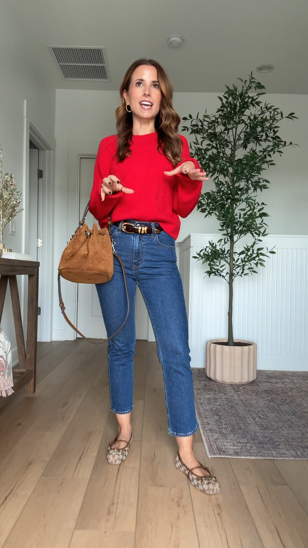 My #ootd today! Christmas sweater. Elevated casual outfit. Abercrombie red crewneck sweater in XXS. Abercrombie ankle straight jeans in 24 short. Madewell belt in XXS. Tory Burch suede bucket bag. Gucci ballet flats are TTS. 

#LTKHoliday #LTKPetite #LTKSeasonal