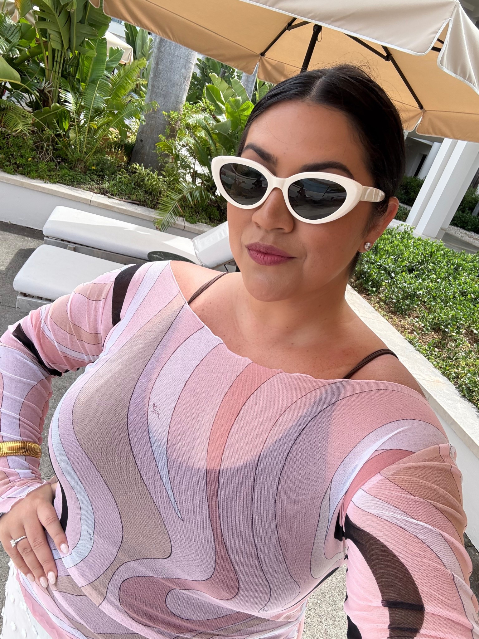 This PUCCI top is the perfect vacation piece to throw on over a bathing suit or tank! 

#LTKMidsize #LTKSummerEdit #LTKSwim