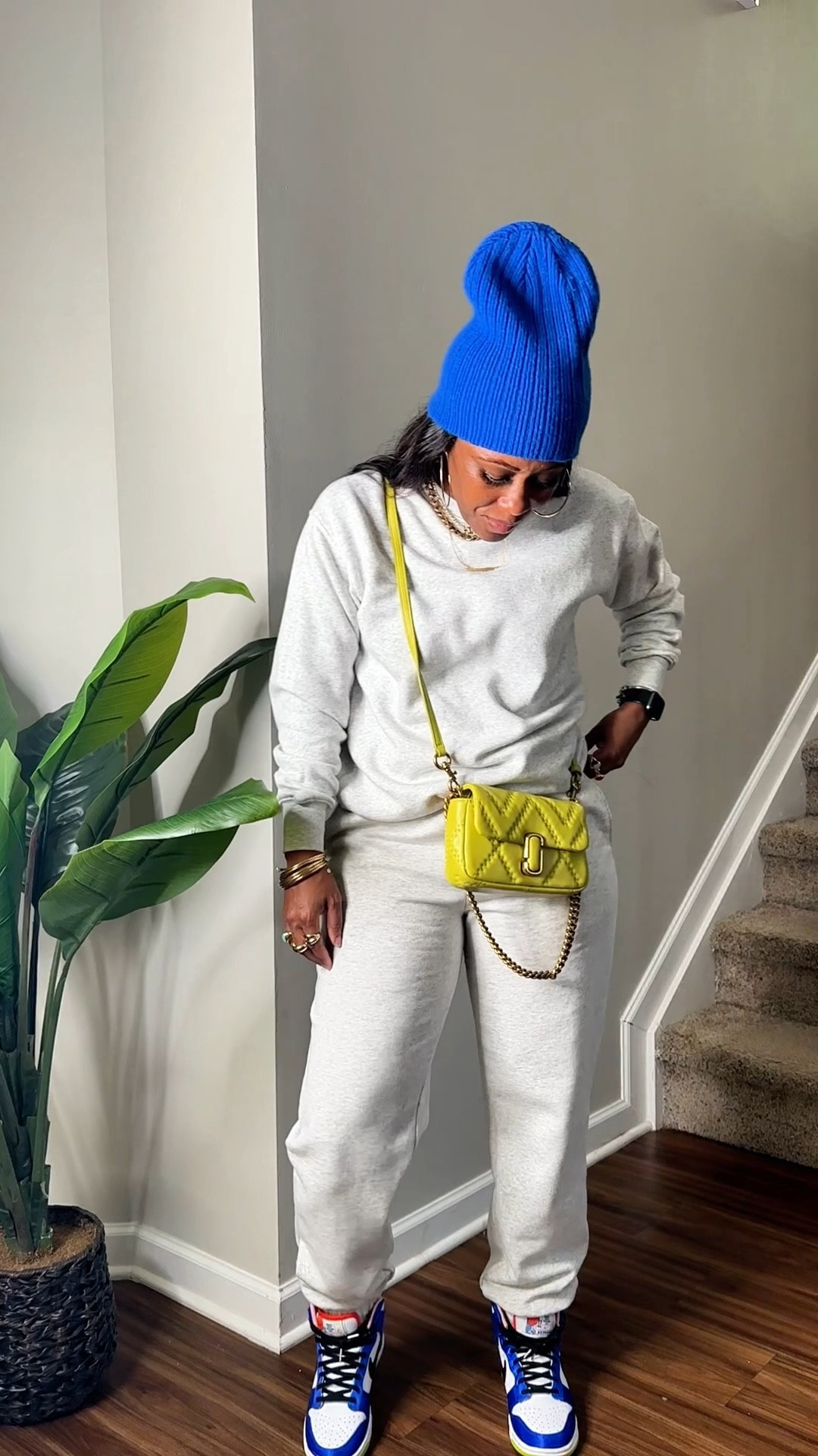 Light heather grey fleece sweatshirt and matching fleece joggers. I style it with a blue beanie, lime green Marc Jacob’s quilted crossbody bag, and Nike dunk high blue satin sneakers 

Shirt: size xxs 
Pants: m

#LTKootd #LTKPetite #LTKFindsUnder50