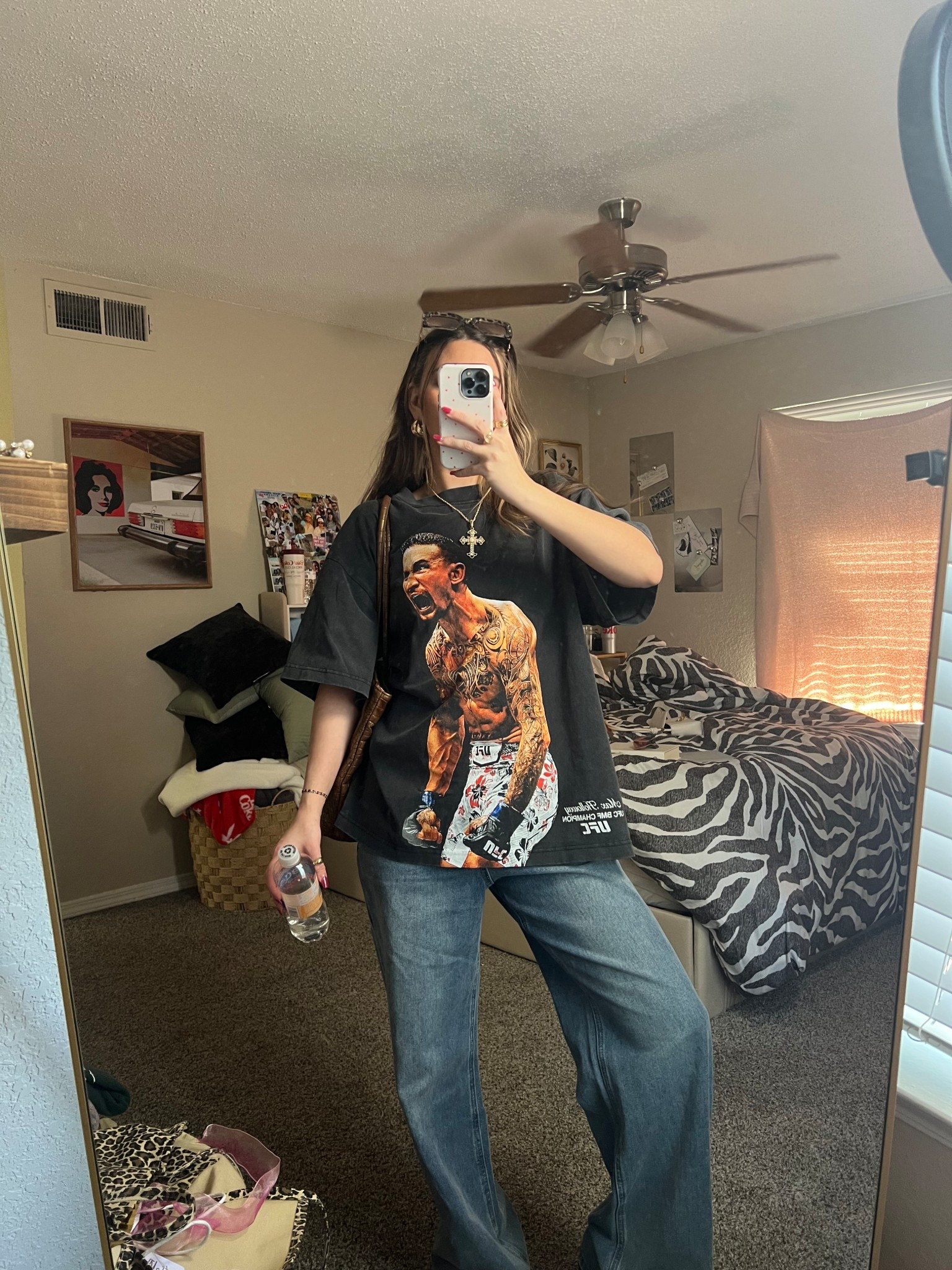 Effortless off-duty style 🖤 This oversized graphic tee outfit is my go-to for casual days when comfort is key but I still want that cool, laid-back look. Styled with an oversized vintage-style UFC graphic tee and relaxed straight-leg jeans for an easy, worn-in feel. Finished with gold jewelry, sunglasses, and a shoulder bag for that model-off-duty aesthetic. Perfect for running errands, casual weekends, travel days, concerts, or everyday wear. Simple, timeless, and endlessly wearable.
Keywords: oversized graphic tee, vintage graphic tee, UFC shirt, band tee style, casual outfit, everyday outfit, off duty style, model off duty outfit, relaxed denim, straight leg jeans, baggy jeans outfit, street style outfit, effortless outfit, comfy chic, casual streetwear, neutral outfit, laid back style, capsule wardrobe, LTK outfit, LTK finds, casual fashion, minimalist street style

#LTKootd #LTKdayinmylife #LTKgrwm