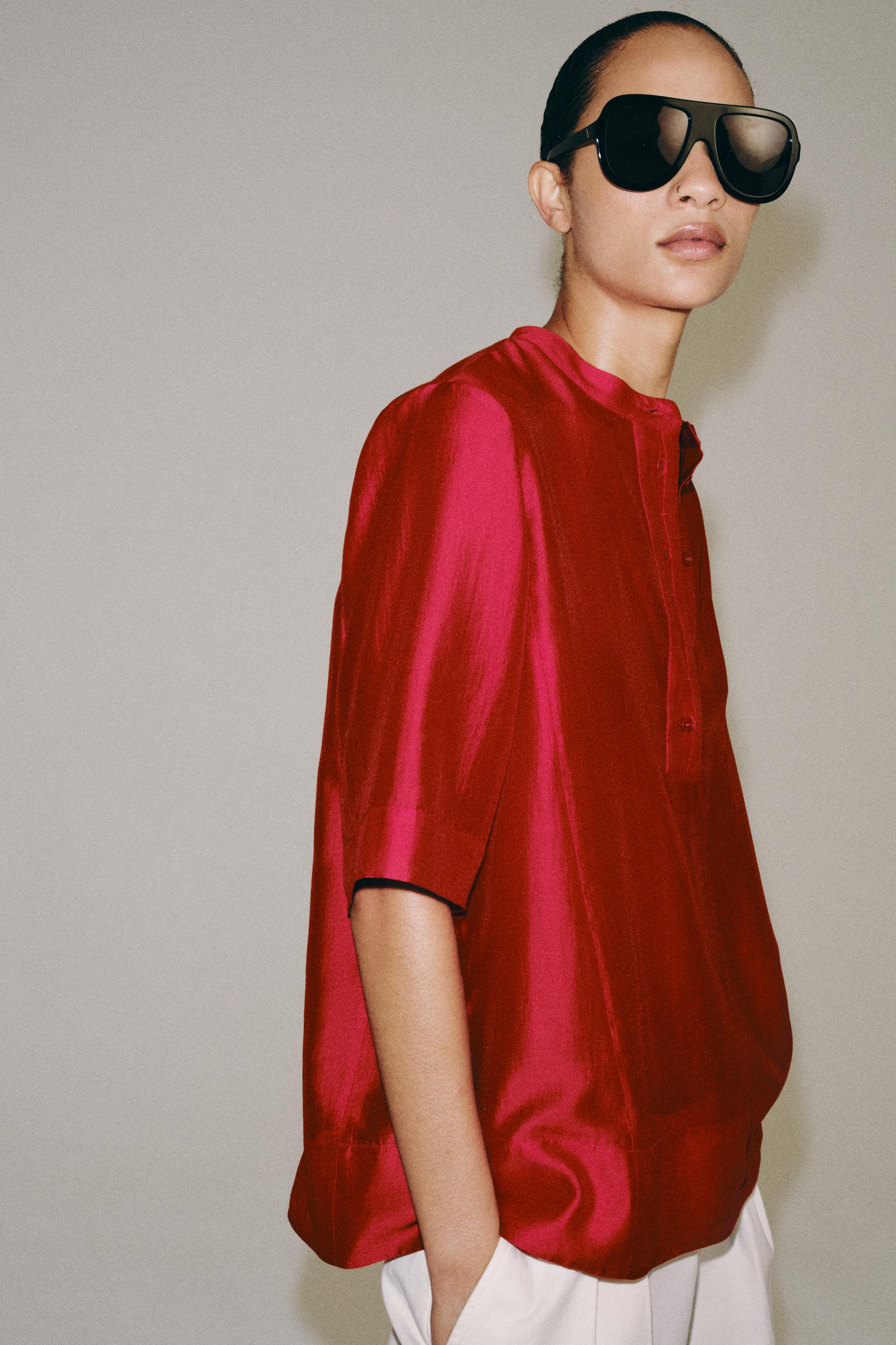 ZARA WOMAN COLLECTIONBlouse made of a lyocell blend yarn. Round neck and short sleeves. Straight ... | Zara US