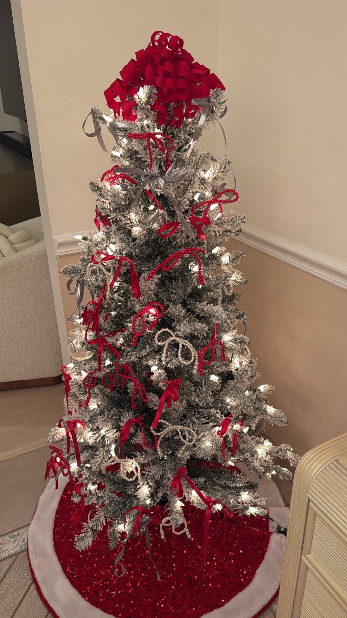 red ribbon Christmas tree, flocked tree decor, red tree skirt, silver ribbon holiday, pearl garland Christmas, cozy holiday home, Christmas decorating ideas, traditional red Christmas aesthetic, winter decor finds, holiday bow tree, festive home styling, classic holiday look, red and silver Christmas tree inspo

#LTKHoliday #LTKCyberWeek #LTKSeasonal