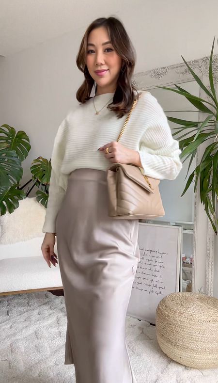Classy winter pregnancy outfit with satin skirt and sweater with YSL Loulou bag 

#LTKbump #LTKSeasonal #LTKworkwear