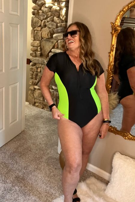 
Womens Short Sleeve Rash Guard One Piece Swimsuit Zip Up Bathing Suit Surfing Swimwear UPF 50+.

Available in multiple colors but I love the neon panels. It is very supportive 
 

#LTKcurves #LTKfit #LTKswim