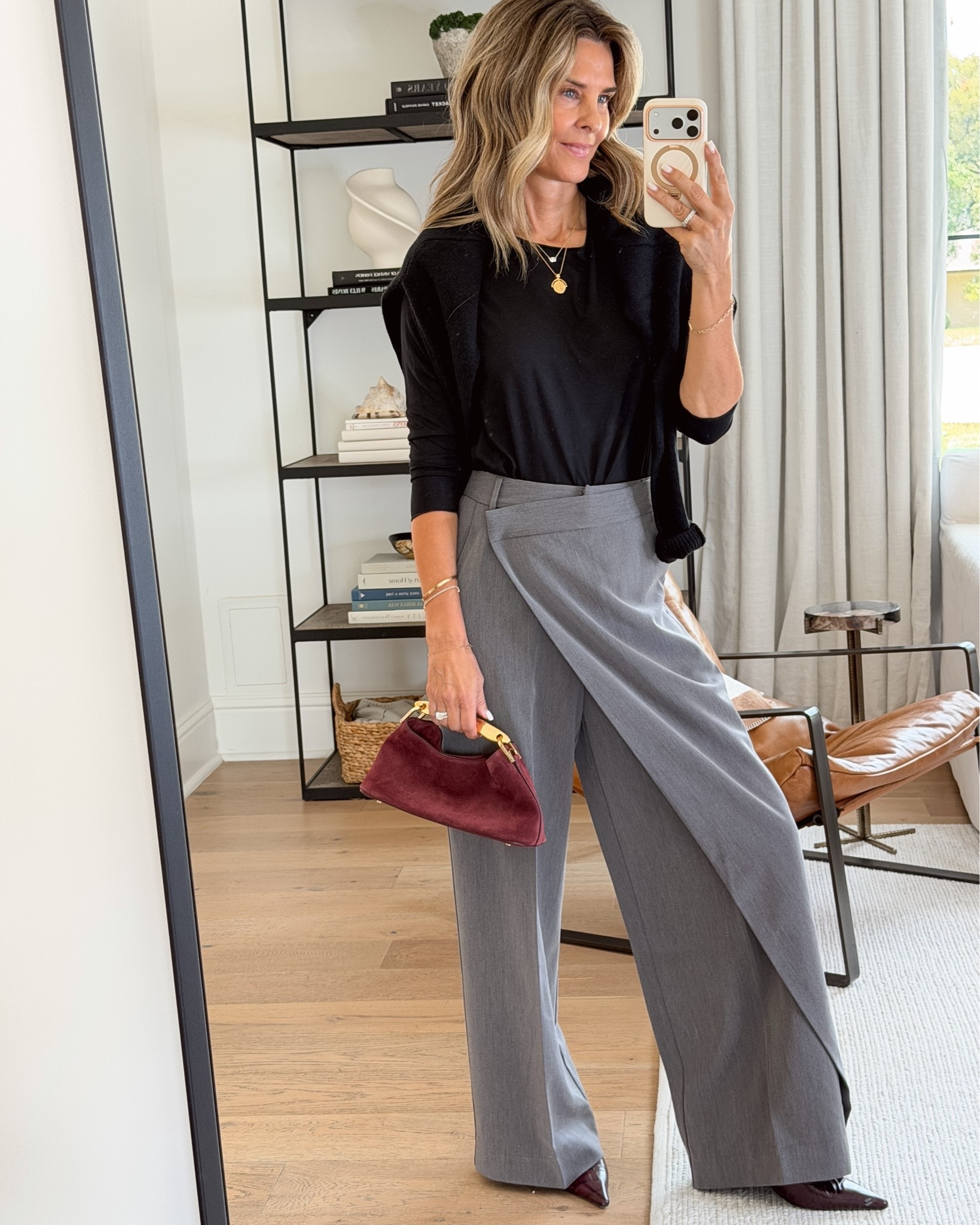 I’m 5’6
-black cashmere feel v neck sweater XS
-grey wrap around trouser XS
-burgundy suede bag is the perfect pop of color
-leather burgundy pointy heel 6.5