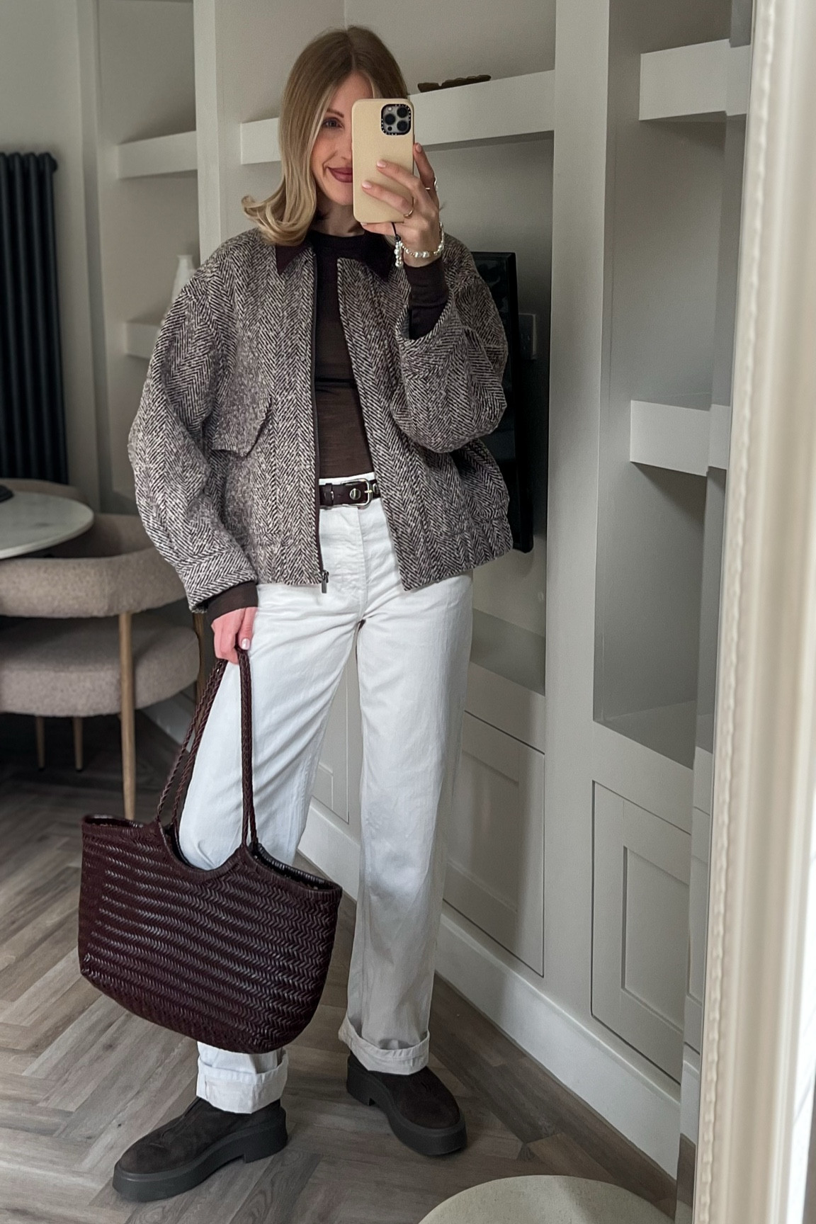 Tweed baseball jacket  - get 12% off with code CHARLOTTE12 

bomber jacket 
brown woven bag 
Zara white jeans 
Massimo dutti studded belt 
brown top 
Arket long sleeve top 
casual chic brown outfit 
the row suede zip boots 
suede boots 

Transitional outfit winter to spring 

#LTKuk #LTKshoes #LTKFashionMonth