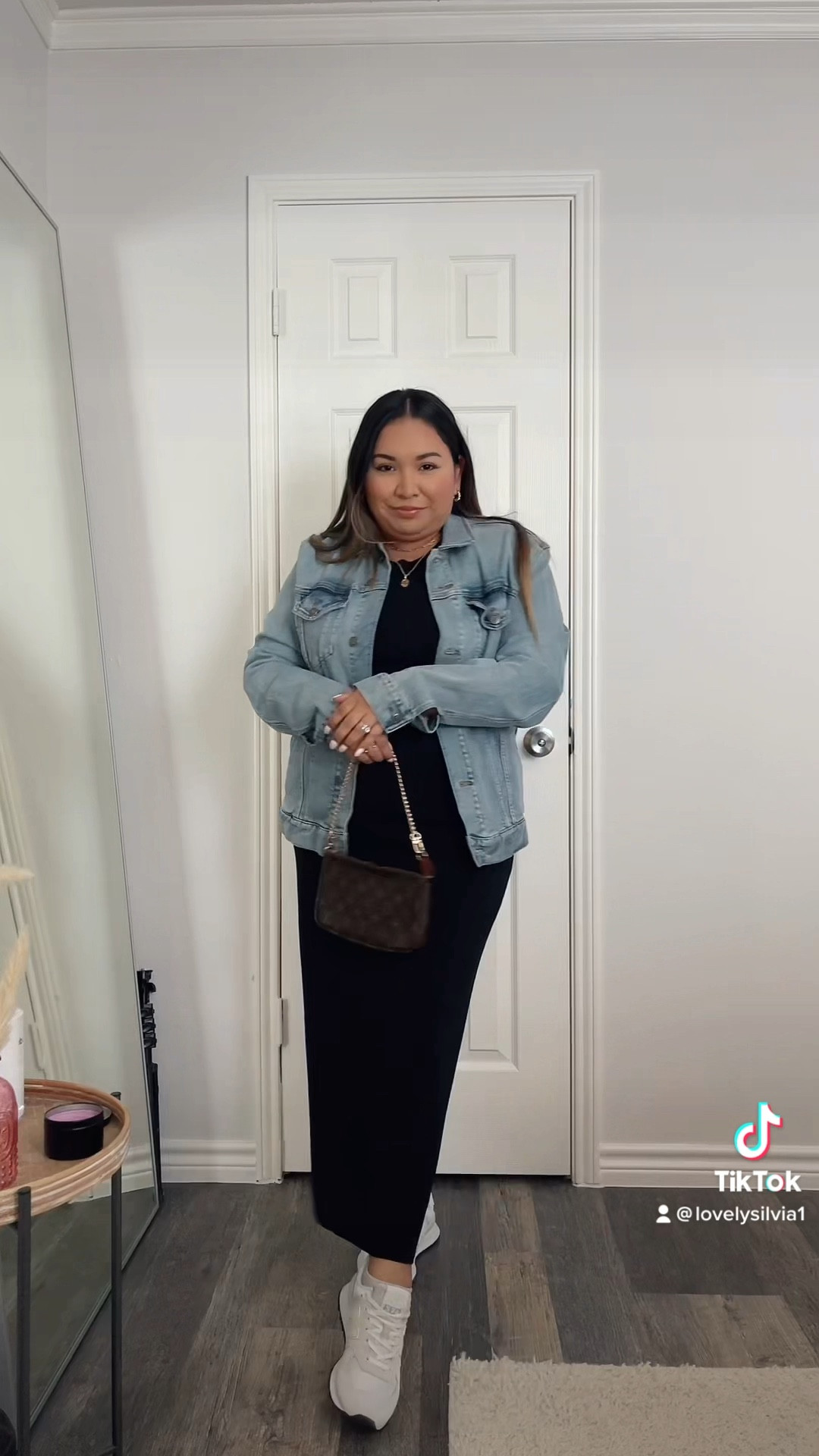 30 Days of Outfits: Day 7 is a black midi (ish) lol dress! This would be a great outfit to wear to a baseball game with a ball cap 🖤 

black maxi dress, black midi dress, casual dress, denim jacket, new balance sneakers, spring outfit, summer outfit 

#LTKstyletip #LTKsalealert #LTKunder50