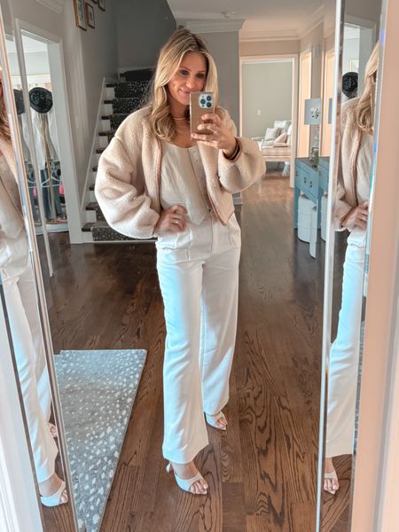 Weekend outfit ☁️ love these white tailored trousers, perfect for spring. Paired them with this vest from H&M & my favorite white Tony Bianco heels. Wearing a small in the vest & a 26 in the pants  

#LTKfindsunder100 #LTKSeasonal #LTKstyletip