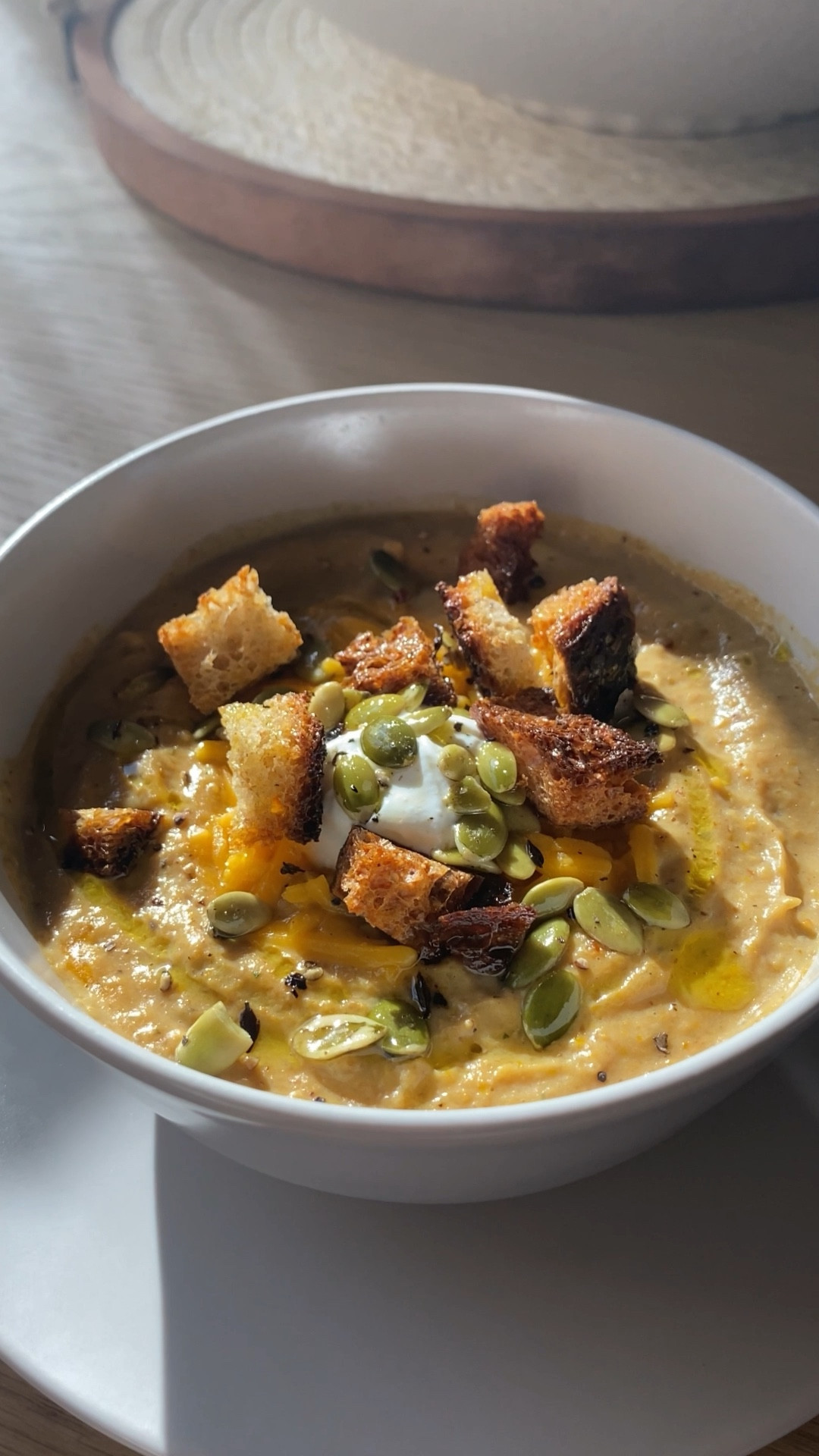 Roasted Squash Soup in my Magnolia for Target enameled cast iron pan. Finished with sour cream, crispy croutons, and roasted pepitas. A perfect autumn, one-pan meal. 🍁

#LTKhome