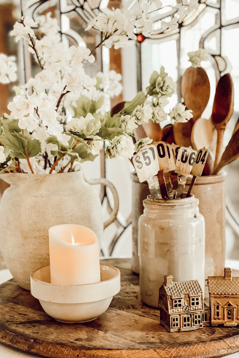 Here is a simple side table look that you can use in your own home by mixing and matching antique and new home decor pieces. These neutral pieces blend seamlessly into our woods-and-whites theme.  

 #LTKSeasonal #LTKHome