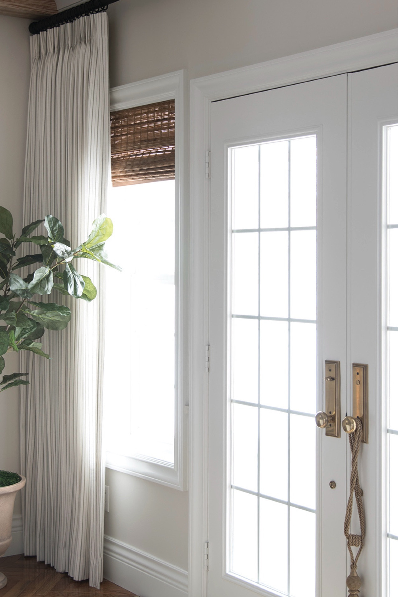 Woven Wood Shades Layered With Drapery Panels

#LTKHome #LTKStyleTip