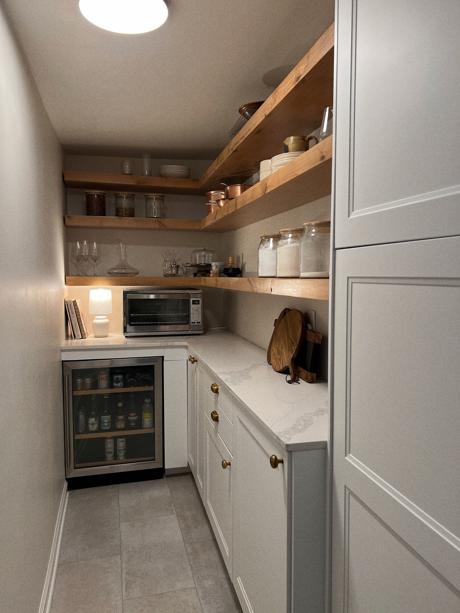 My transitional pantry renovation is complete! Floating shelves, a beverage cooler, and beautiful decor really is completes the look.

#LTKhome #LTKFind