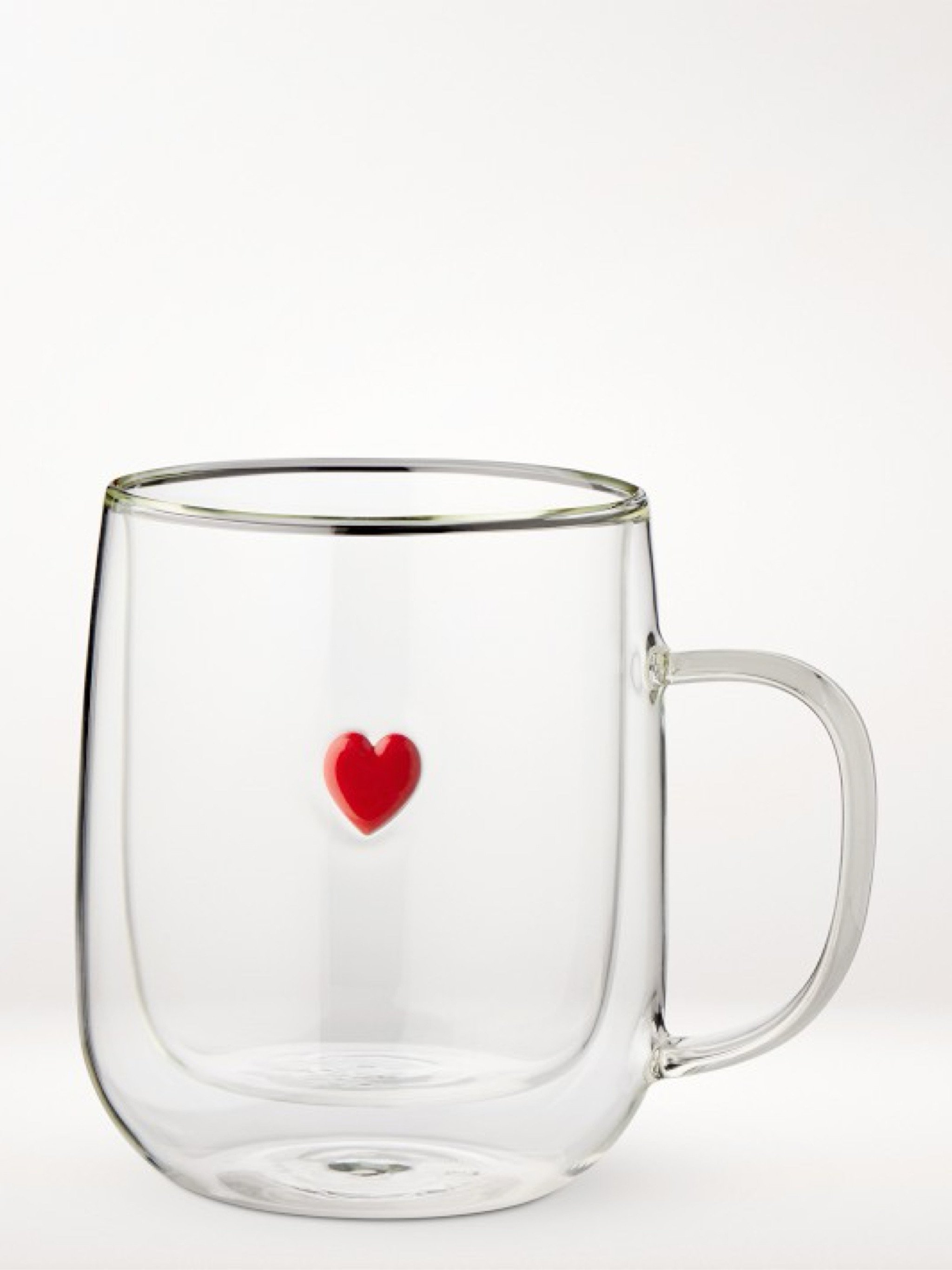 Heart Mug Set of 2

Warm someone's heart with our double-wall mugs. Crafted with two layers of durable yet lightweight borosilicate glass, they keep coffee, cocoa or tea hot while remaining cool to the touch. The insulated construction also prevents condensation from forming with cold beverages.
* 		Dishwasher safe.


#LTKParties #LTKHome #LTKWatchNow