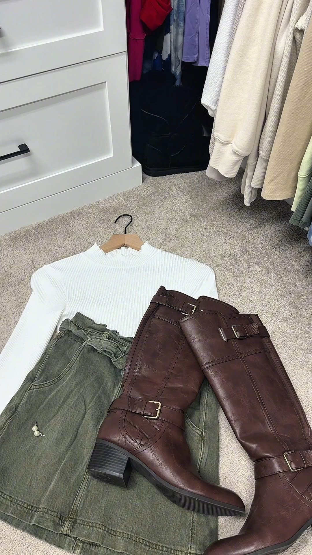 Effortless fall vibes 🍂 A crisp white ribbed top, olive denim skirt, and tall brown riding boots 🤎 the perfect combo for cozy chic style. Pearl studs add the finishing touch for a timeless look 🤍👢 #FallStyle #OOTD #CozyChic #FallOutfits #ClosetInspo

#LTKShoeCrush #LTKSaleAlert #LTKSeasonal