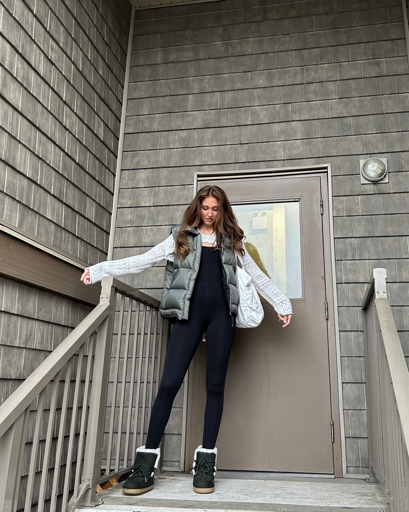 Puffer vest, Sherpa lined boots, ankle boots, green boots, winter boots, aritzia jumpsuit, shrug, tote bag, cold weather outfit, sweater weather, winter style , winter fashion, shoe dazzle 