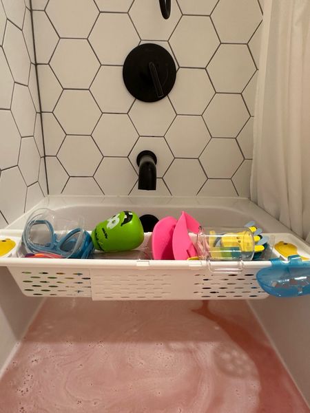 Love this tub basket which can be used to hold bath toys or bath products. It is expandable so it will fit all styles of a tub and keep everything organized! 

#LTKHome #LTKGiftGuide #LTKKids